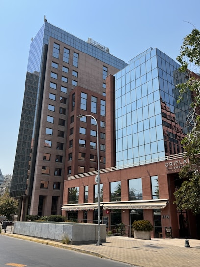 A modern office building with the Barlas Law Chambers sign in Lahore.