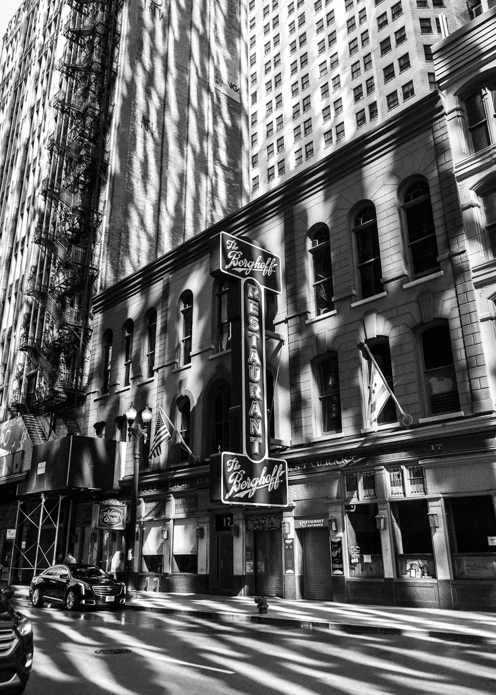 a black and white photo of a large building