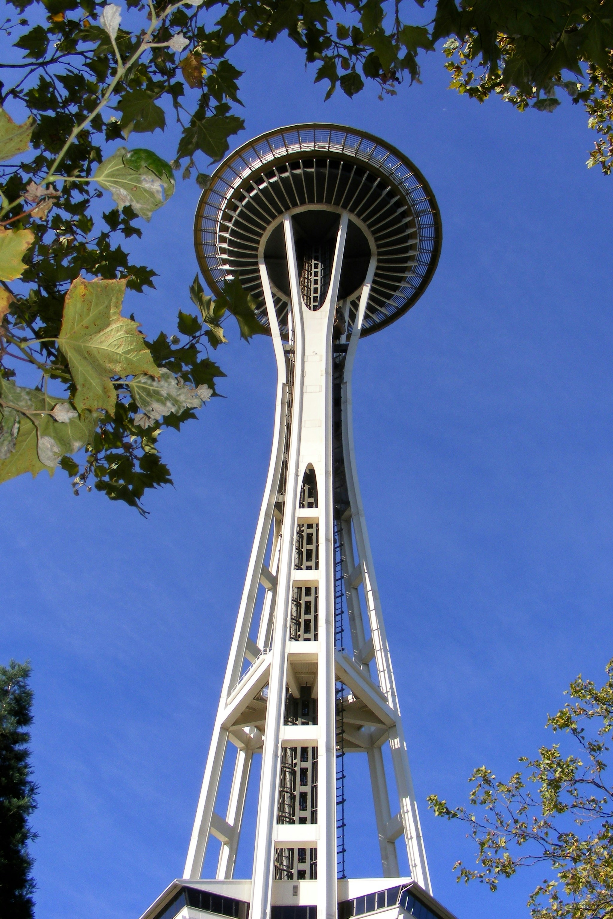 a tall white tower with a sky background