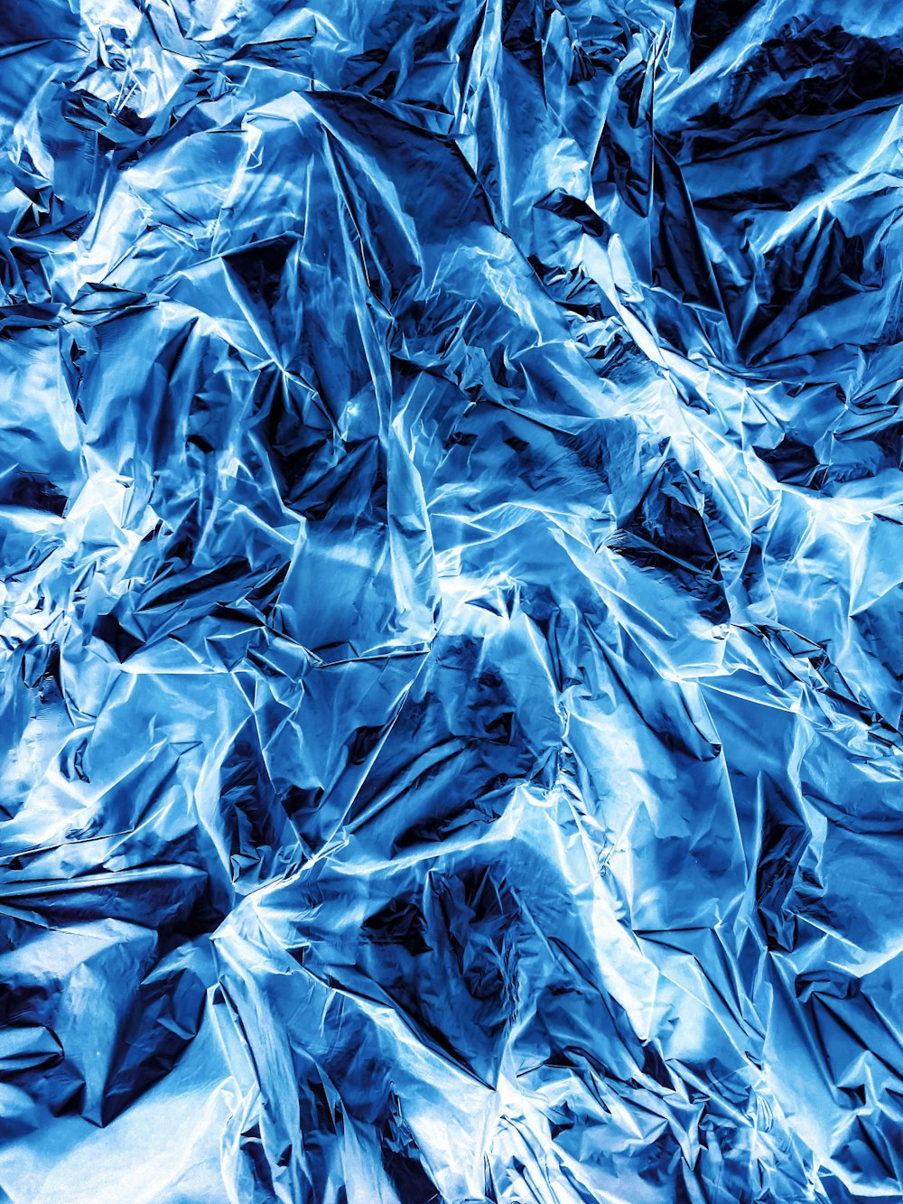 a close up of a sheet of blue foil