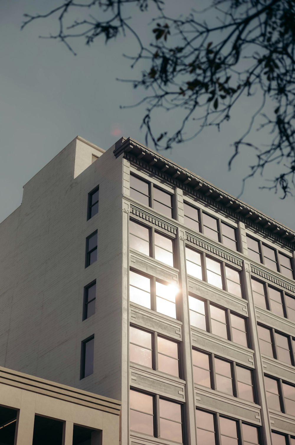 a tall building with a clock on the top of it