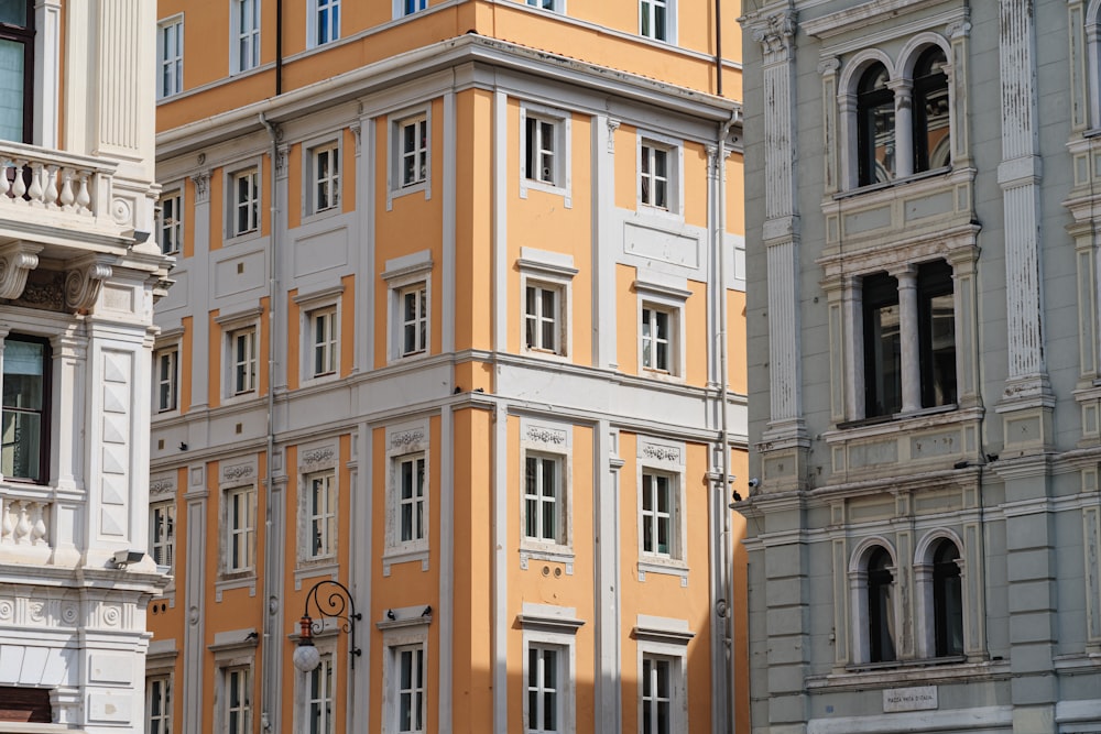 a tall building with a clock on the front of it