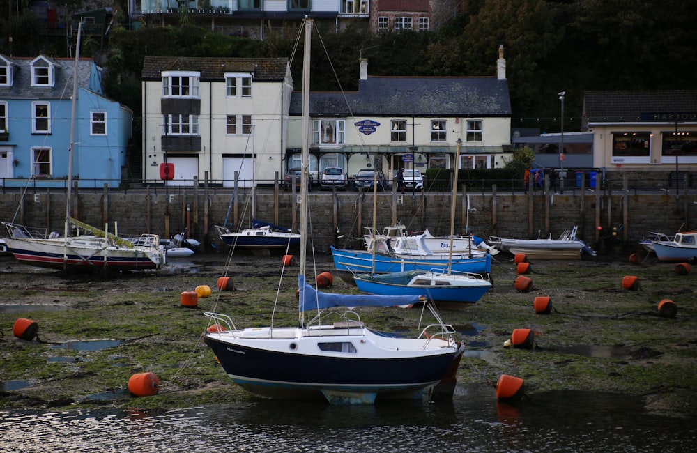 a group of boats that are sitting in the water