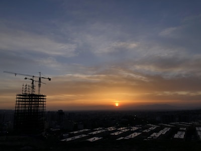 A beautiful sunset over a newly constructed neighborhood.