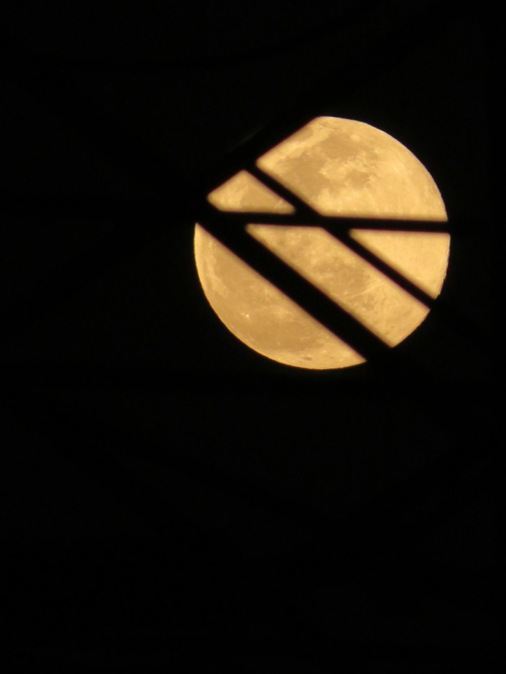 a view of the moon through a window