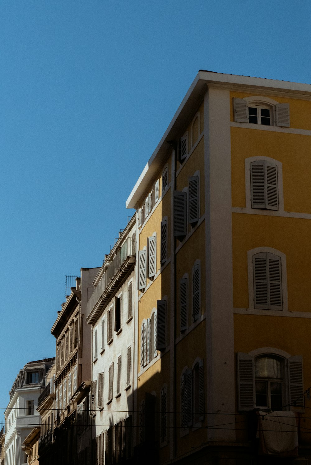 a clock is on the side of a building