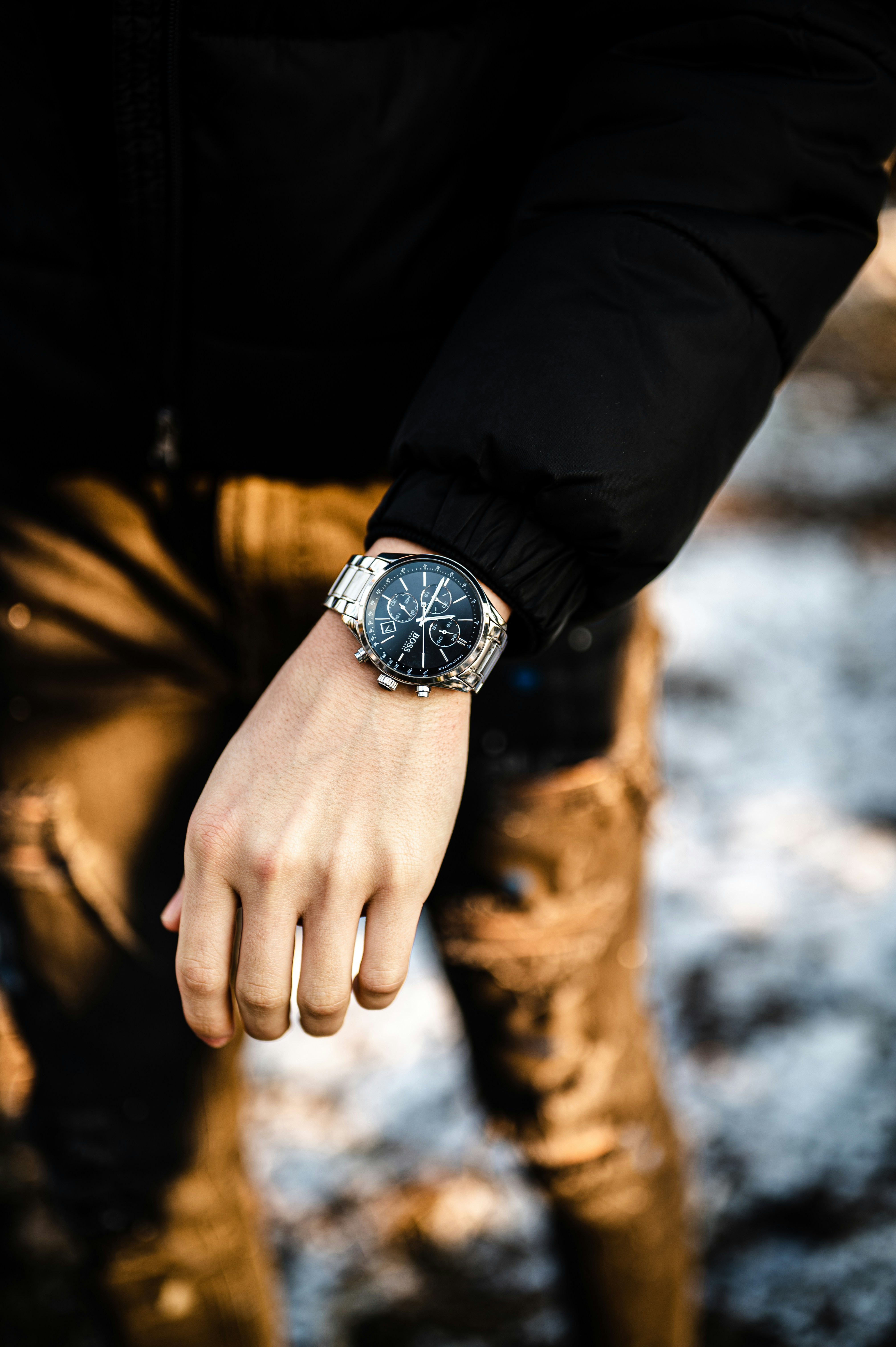 a close up of a person wearing a watch