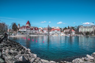 a body of water with a bunch of buildings in the background