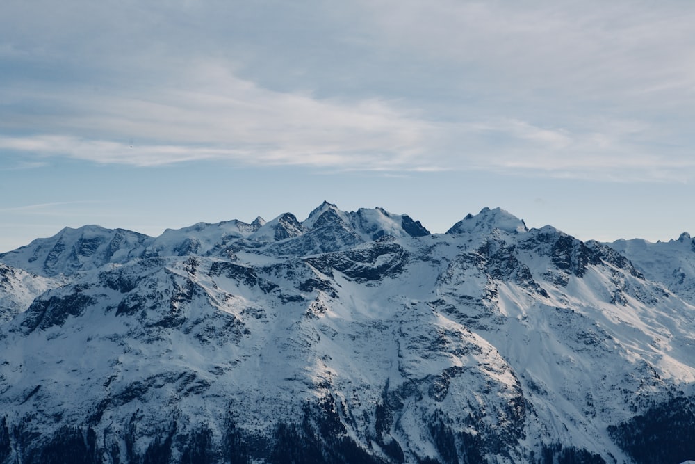 a view of a snow covered mountain range