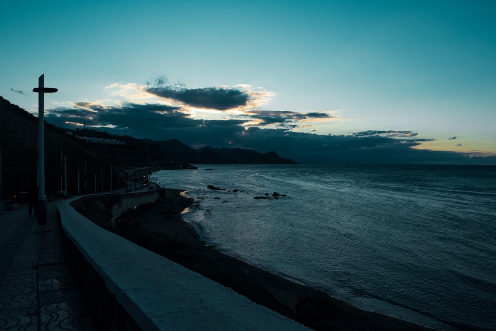 a view of a body of water at dusk