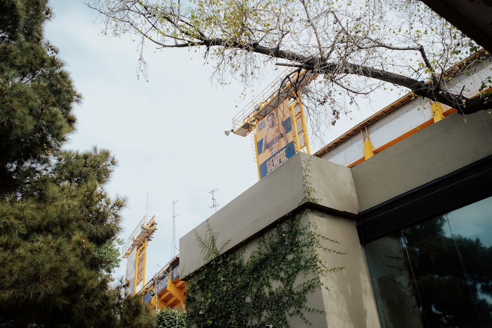 a building under construction with a crane in the background