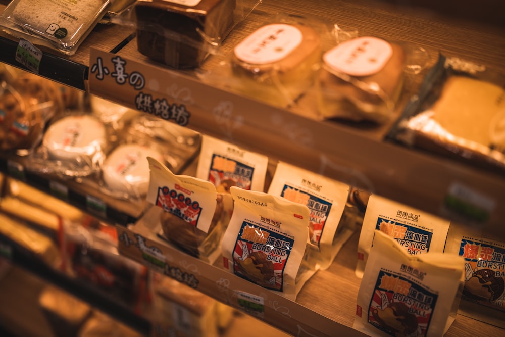 a display case in a bakery filled with lots of food