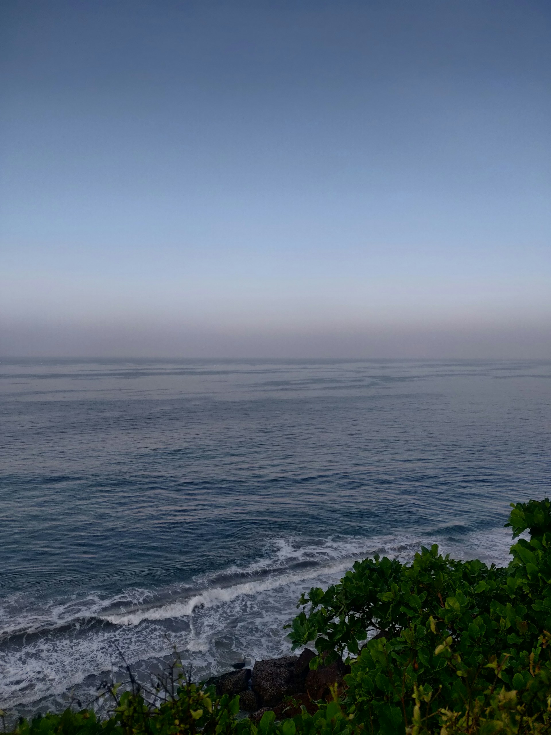 woman wearing yellow long-sleeved dress under white clouds and blue sky during daytime