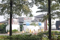 An exterior view of a secure building with automated gates.