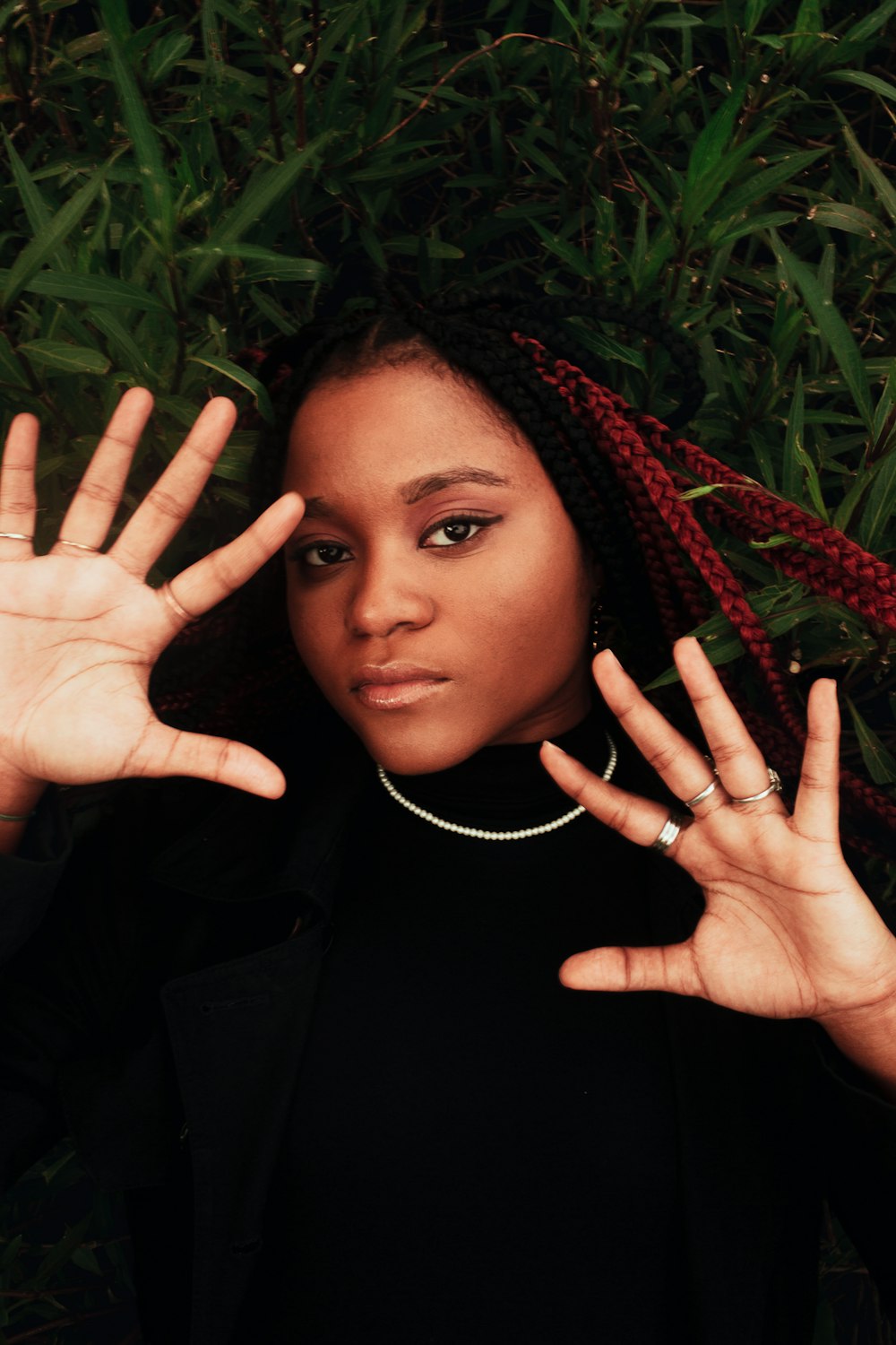 a woman with her hands in the air