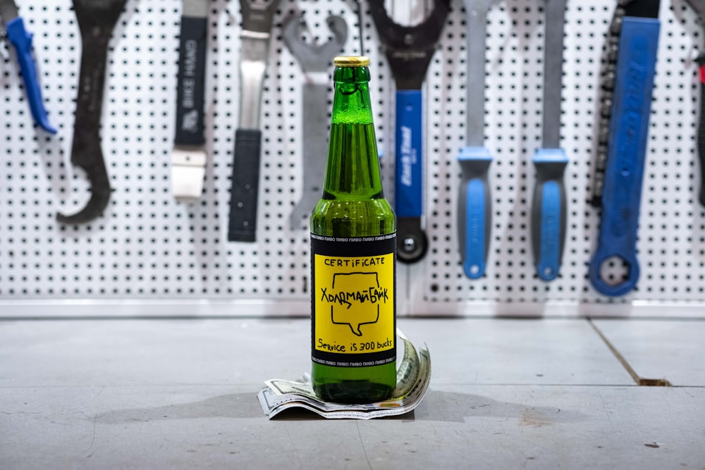 a bottle of beer sitting on top of a table