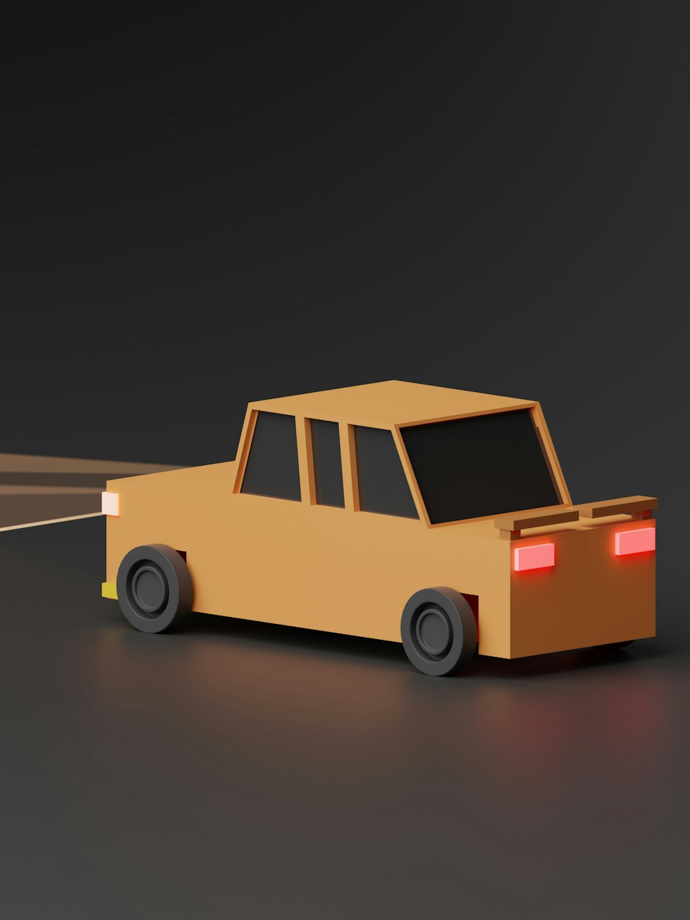a paper model of a car driving down a road