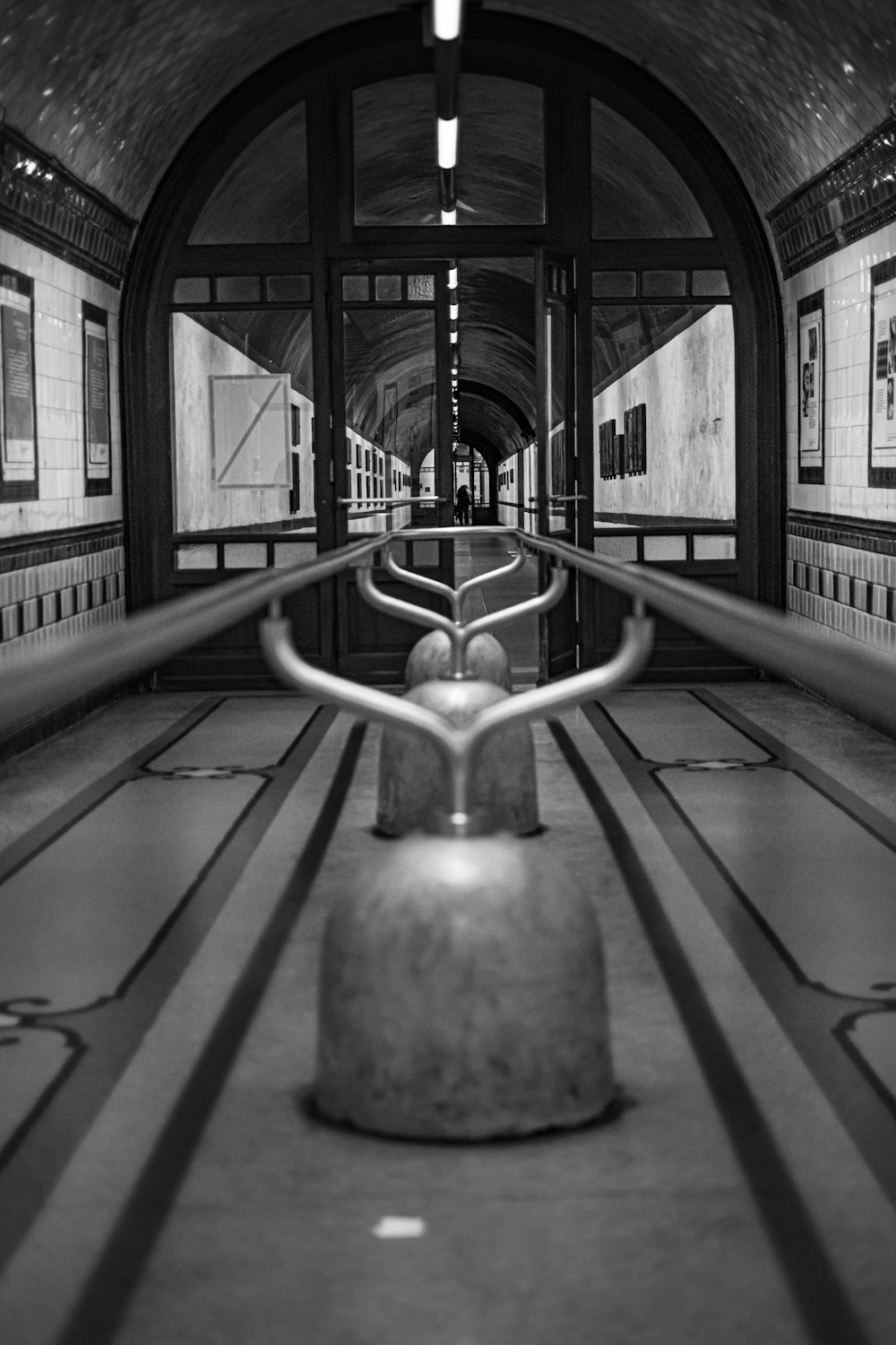 a black and white photo of a train station