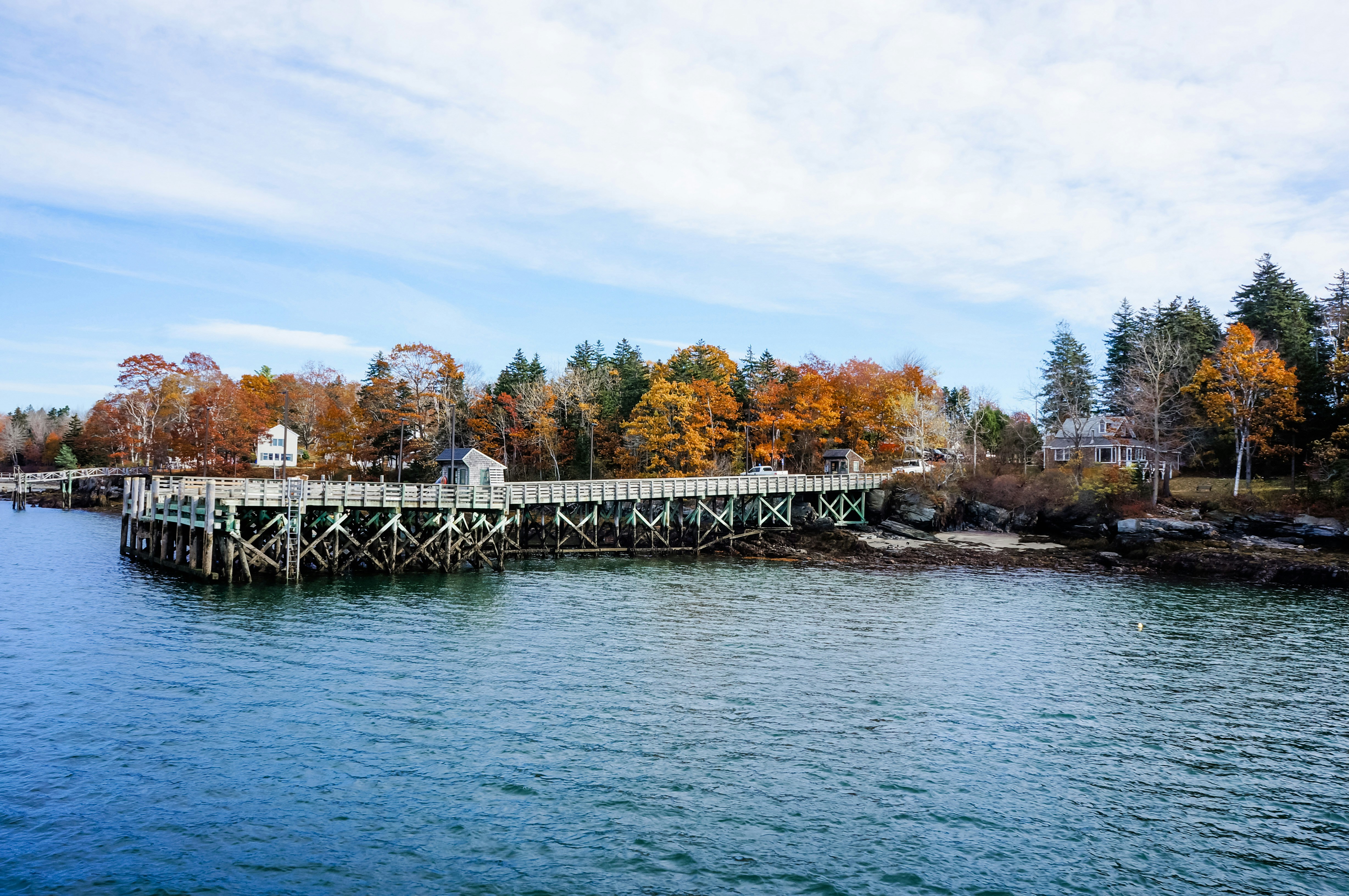 a wooden bridge over a body of water