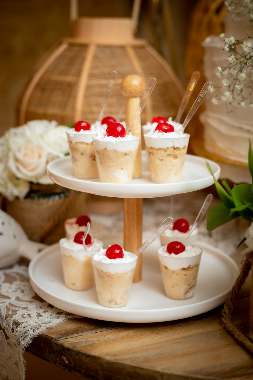 a three tiered tray with desserts on it