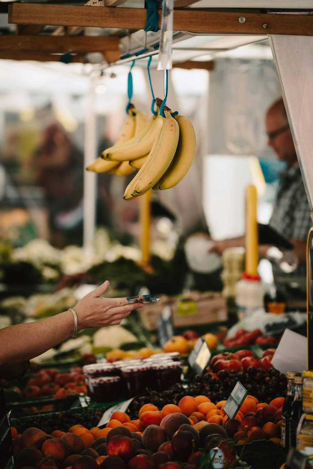 a bunch of bananas hanging from a ceiling