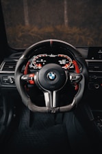 the interior of a car with a steering wheel