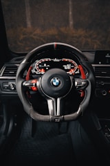 the interior of a car with a steering wheel