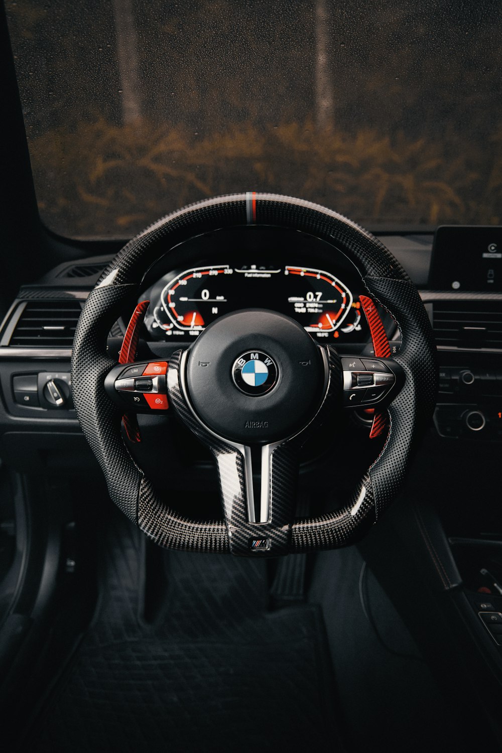 the interior of a car with a steering wheel