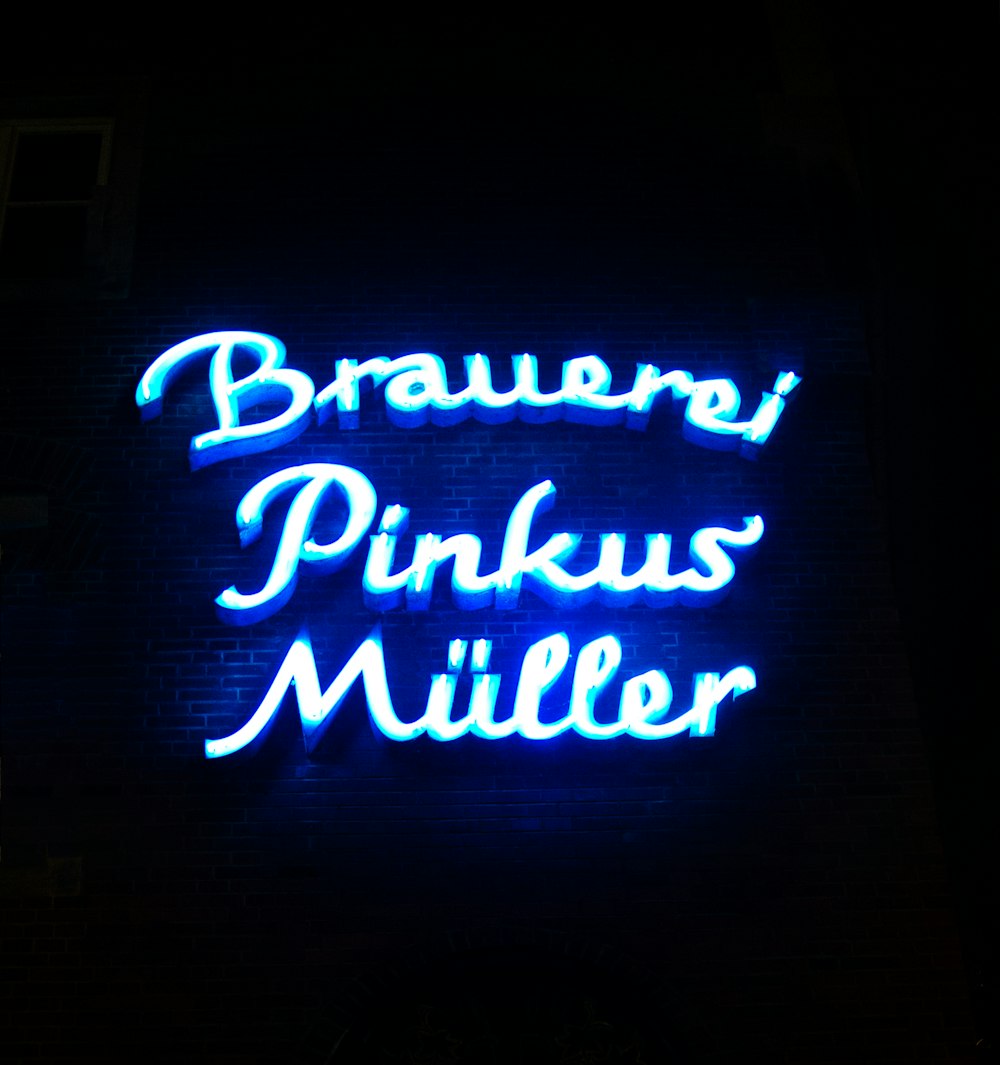 a neon sign that reads brauer's pinkus miller