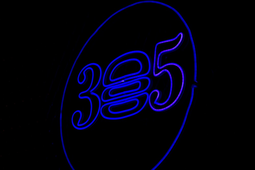 a neon sign with the number 350 on it