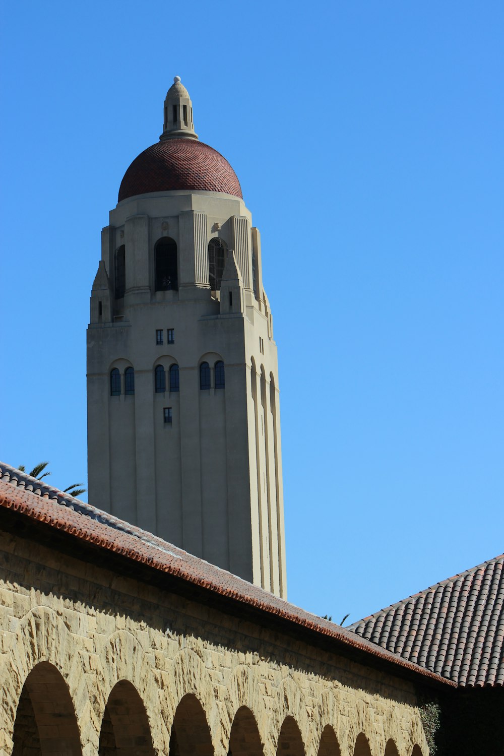 a tall tower with a clock on top of it