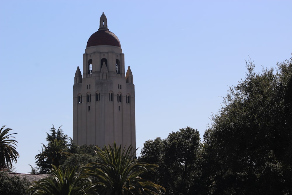 a very tall building with a clock on it's side