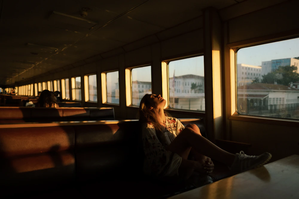 Passenger taking in the scenic desert view from the window