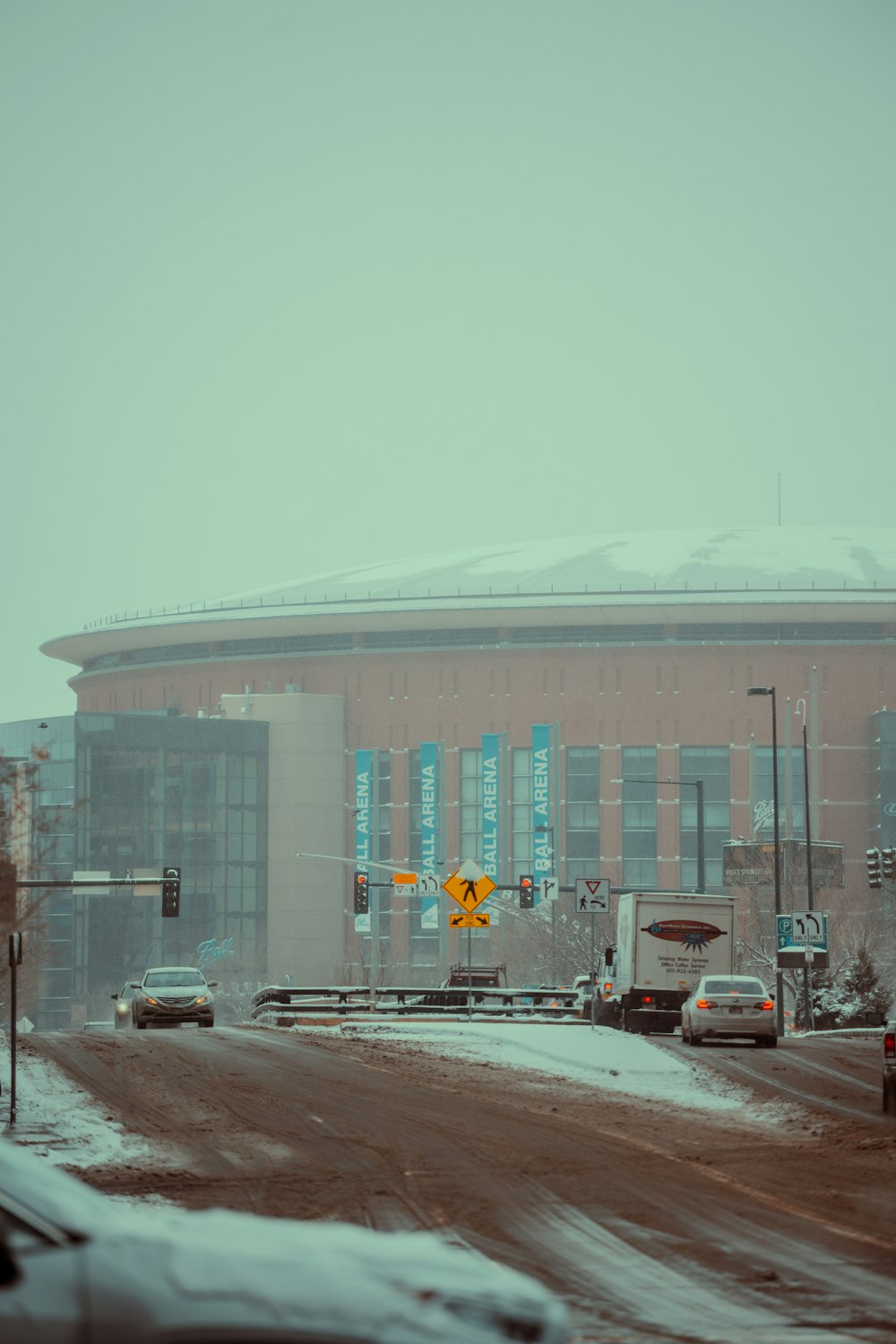 a building with a traffic light in front of it