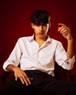 A professional studying numerology charts with a focused expression.