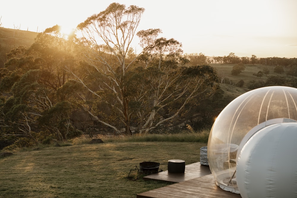 a large inflatable dome sitting on top of a wooden table