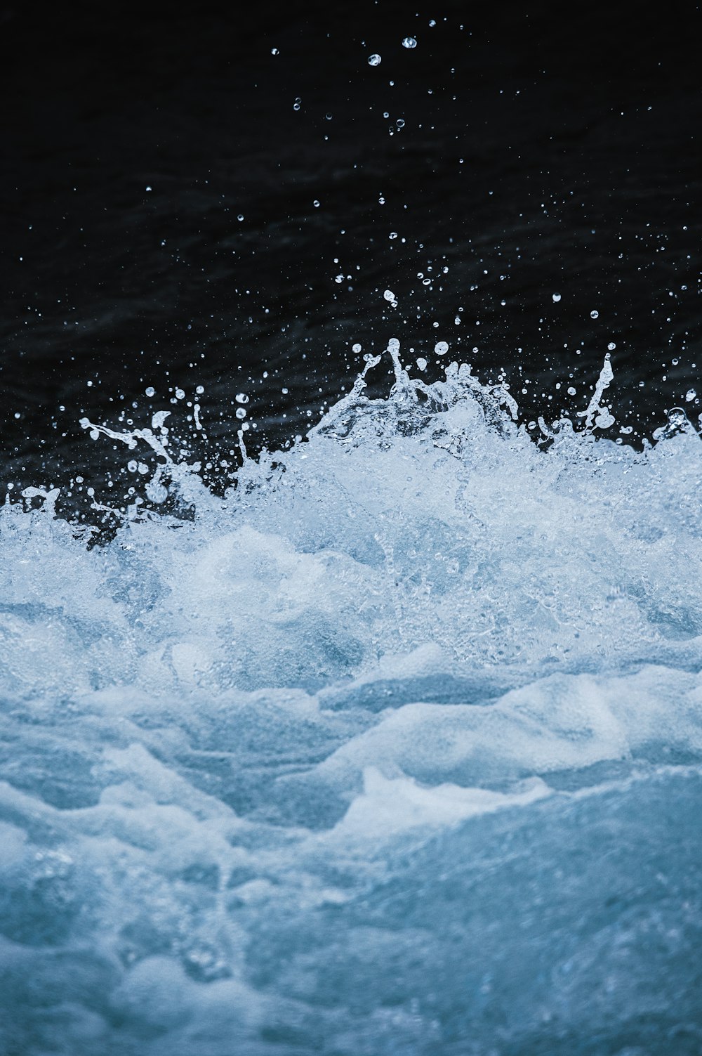 a close up of a wave in the ocean