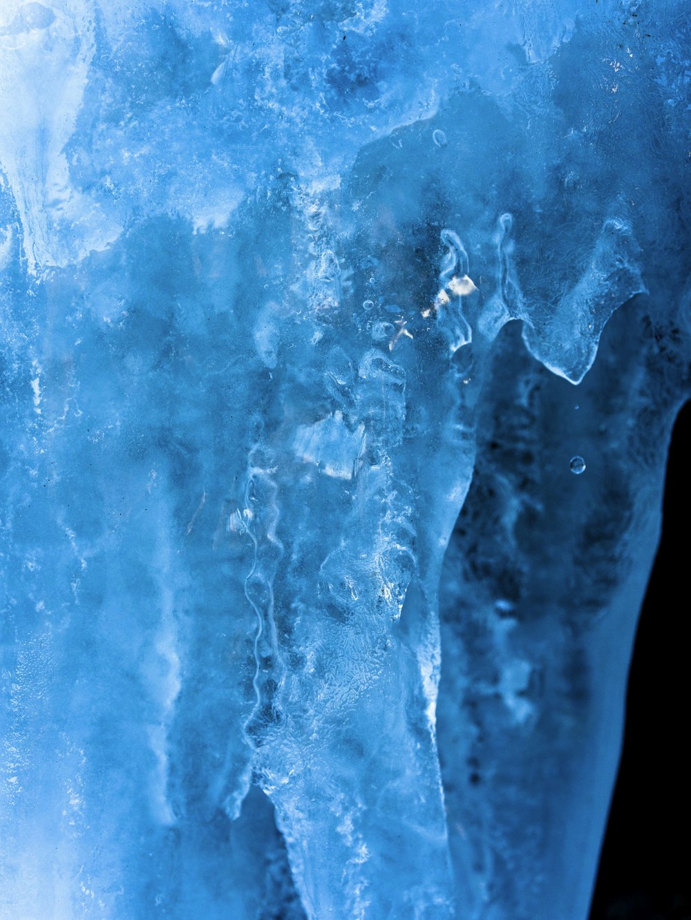 a close up view of ice and water