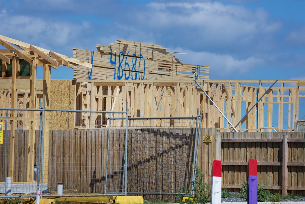 a house being built with wooden framing