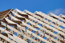 a wooden structure with a sky background