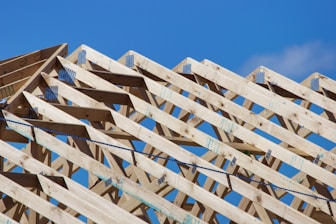 a wooden structure with a sky background
