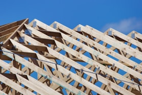 a wooden structure with a sky background