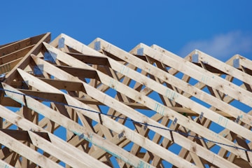 a wooden structure with a sky background