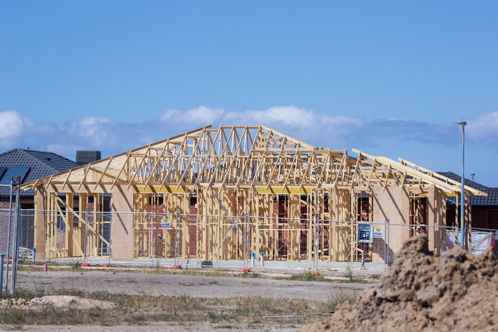 a house under construction in the middle of the day