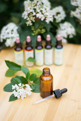 Bach flowers with bottles of essential oils