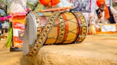 a drum sitting on top of a wooden table