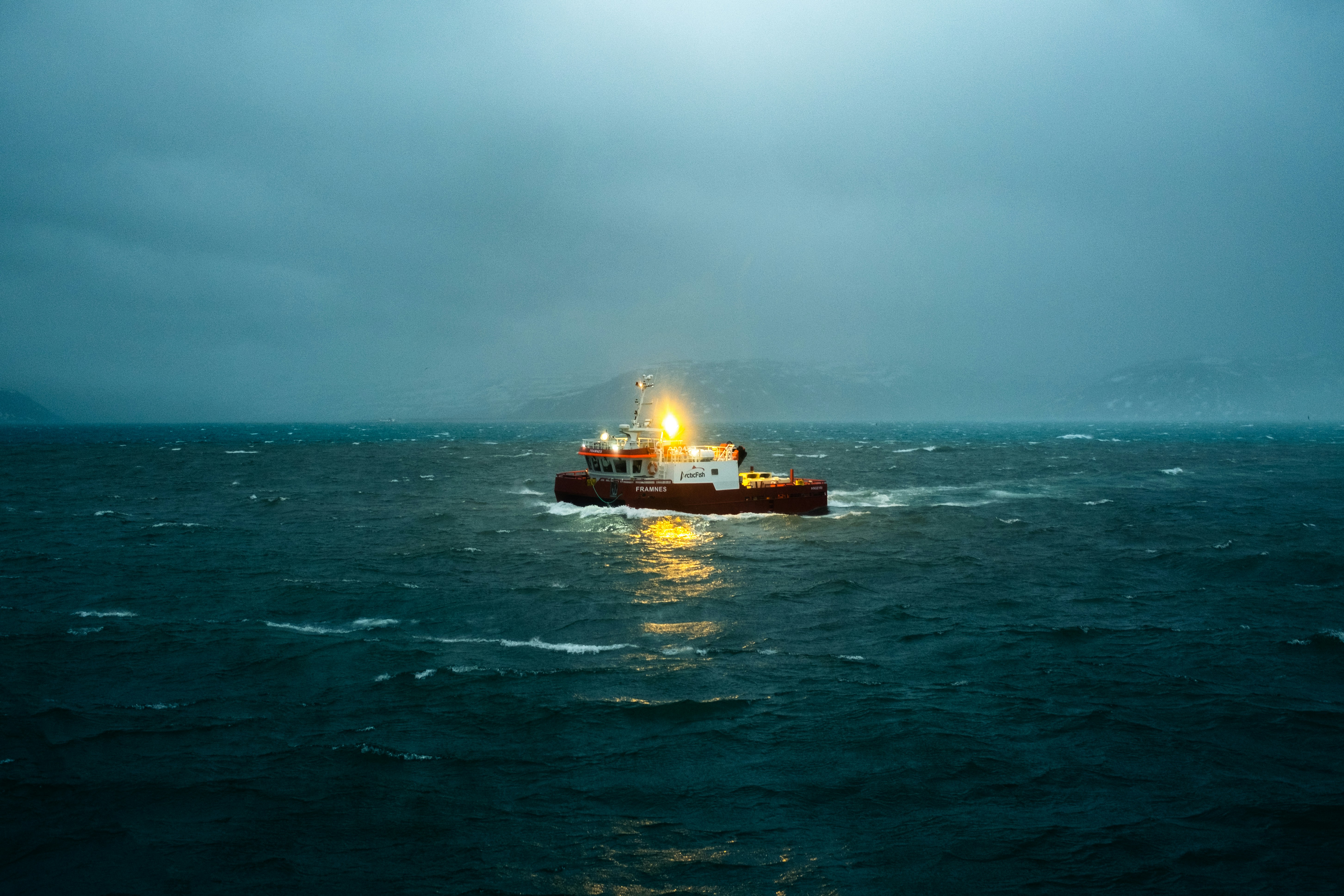 A large boat in the middle of a body of water photo – Free Boat Image ...