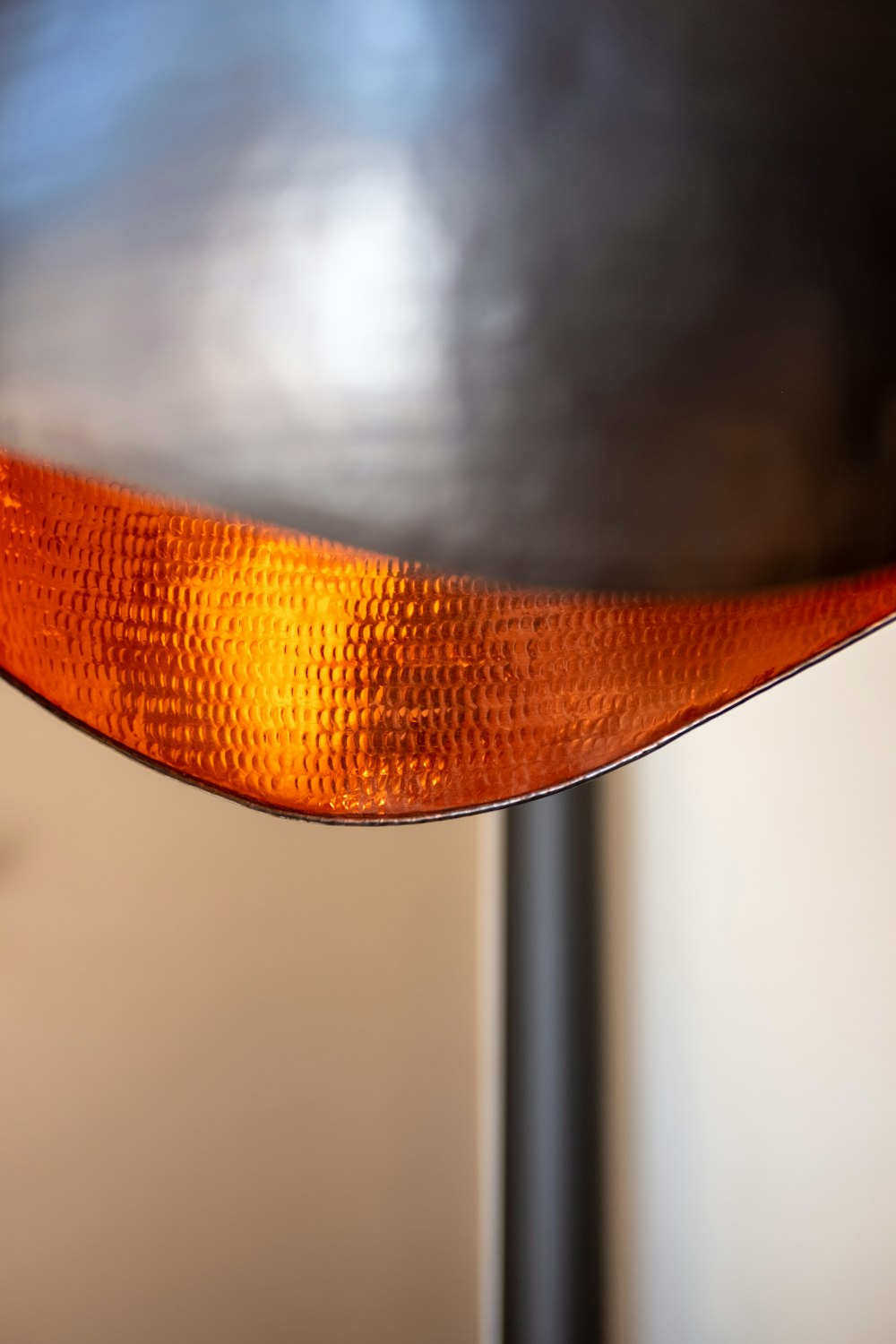 a close up of a metal object with a light on it