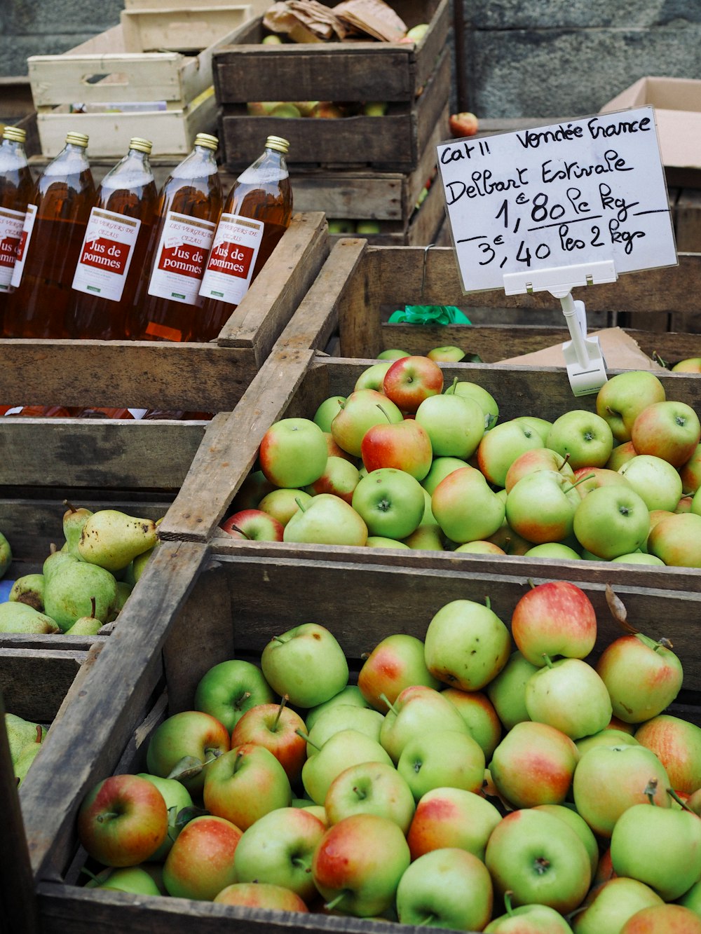 a display of apples for sale at a market