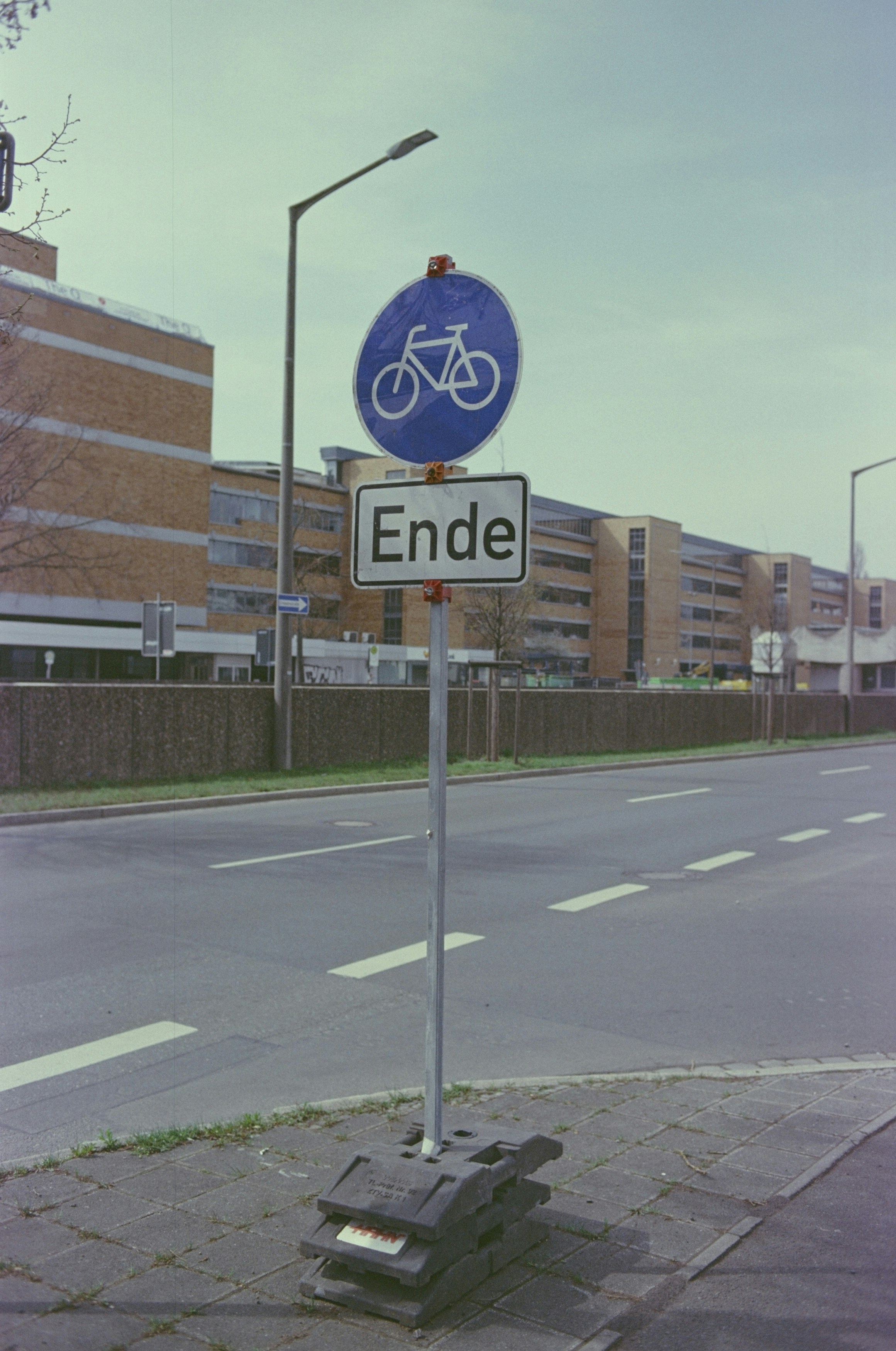 a street sign on the side of the road